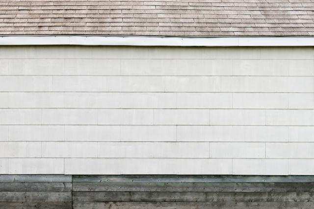 The Storybook Finish: Why Bent Wood Shingles Are the Perfect Choice for a Unique Roof